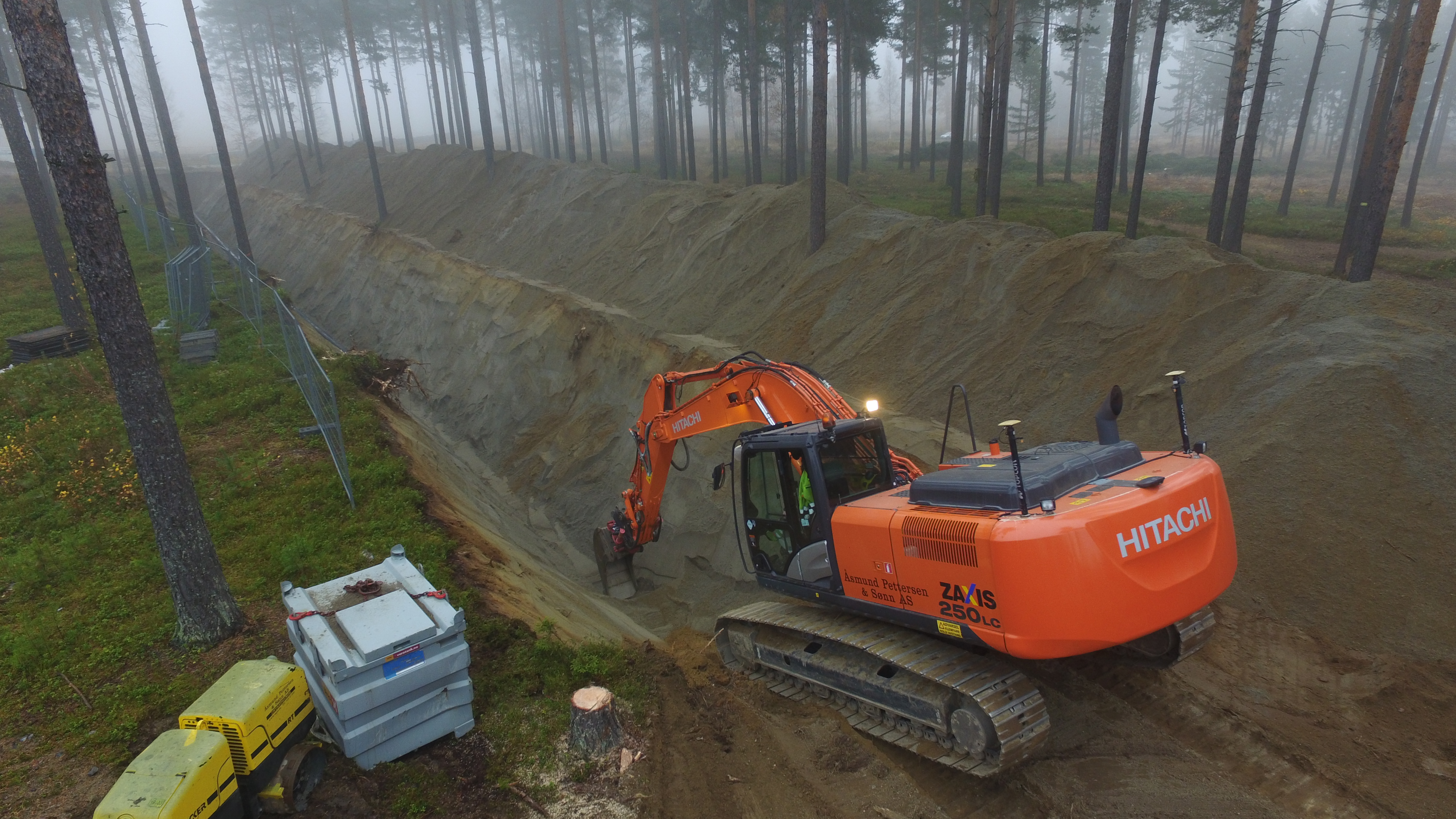 Gravemaskin i arbeid